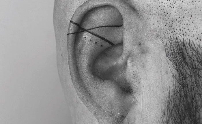 An Ear Tattoo - How Cool Is That. The Abstract Design And Neat Line Work