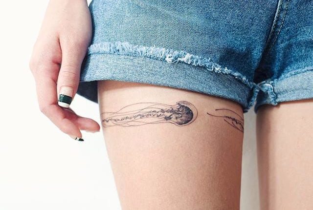 15 Beautiful and Vibrant Jellyfish Tattoos