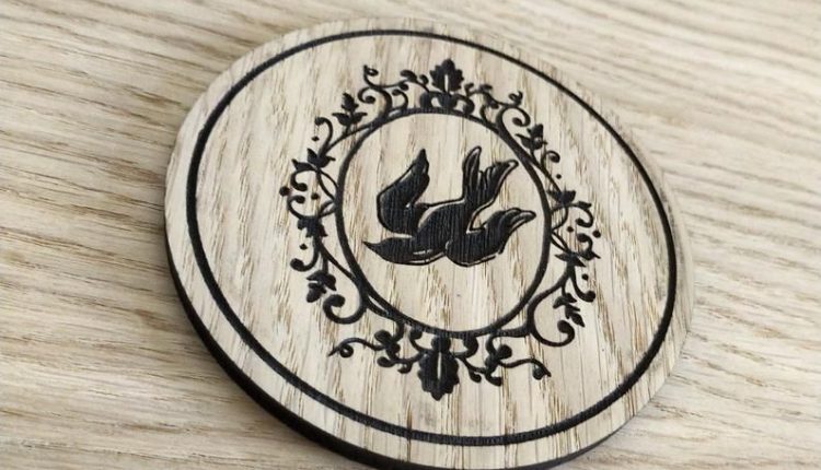 Laser cut wooden coaster. Bioshock infinite tattoo necklace  Elizabeth Bird