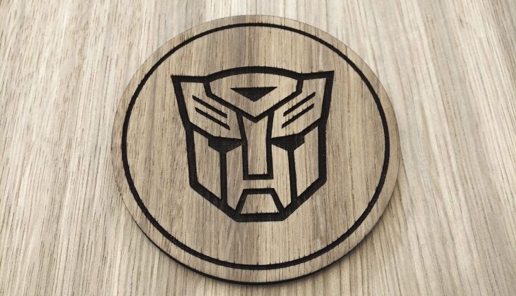 Laser cut wooden coaster. Transformers Autobot 1980s cartoon