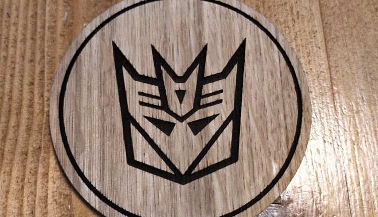Laser cut wooden coaster. Transformers Decepticon 1980s cartoon